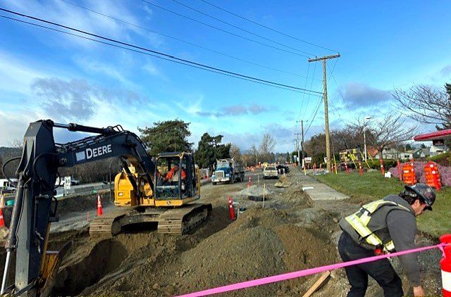 Excavator at the Highway 4 and Beaver Creek Road intersection